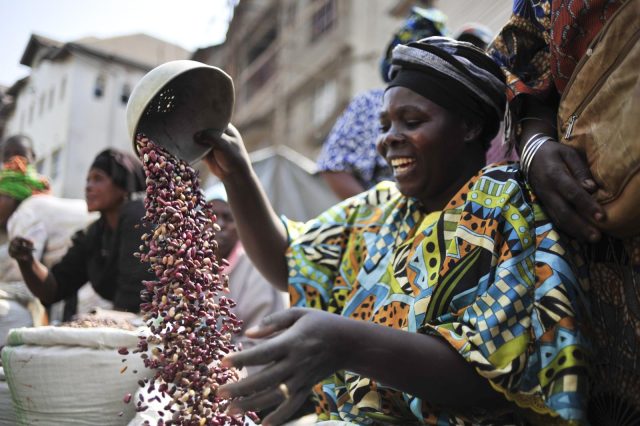 A gorilla bean vendor at a market in Bukavu, South Kivu province. Credit: Neil Palmer for HarvestPlus/CIAT